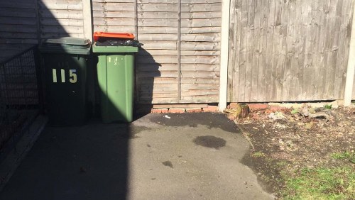Customer documenting an issue with waste collection
